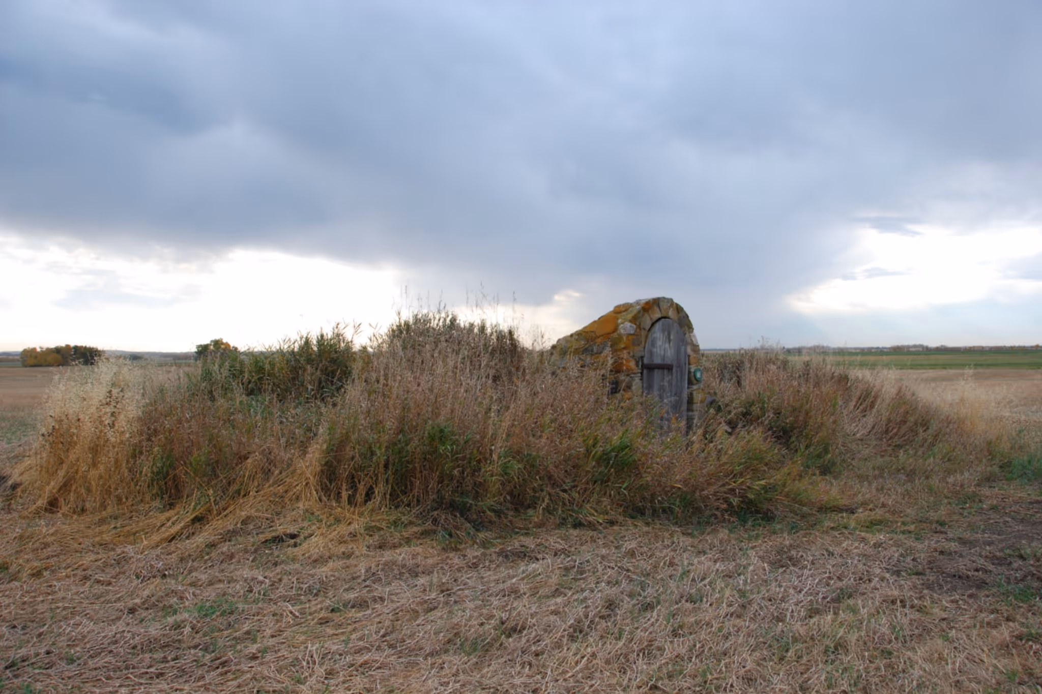 Why there's a door older than Alberta in the middle of a rural field