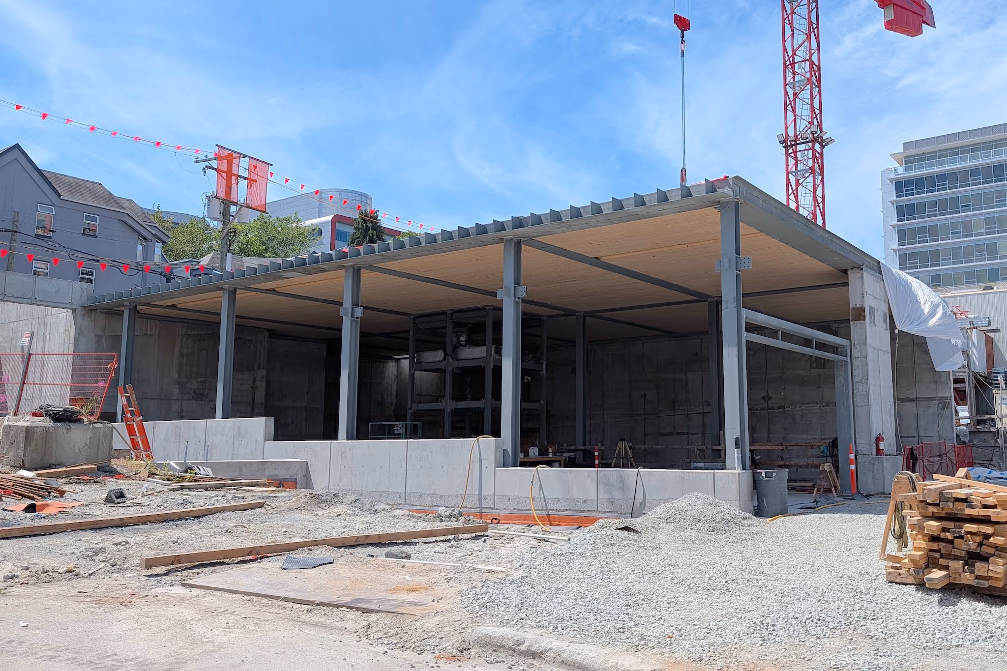 Broadway Subway station entrance buildings begin to take shape above ground