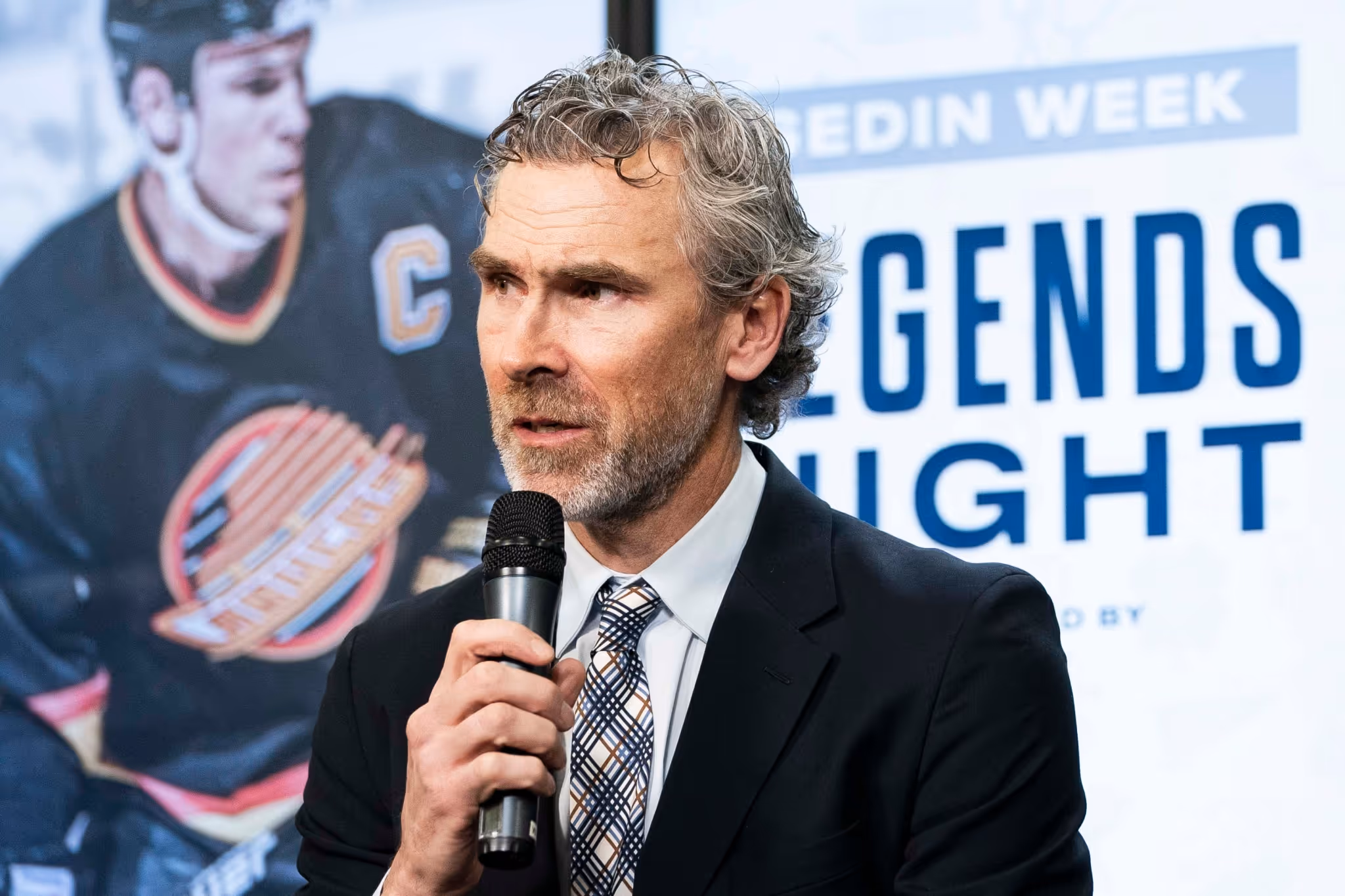 Hronek's agent throws shade at Canucks legend Trevor Linden