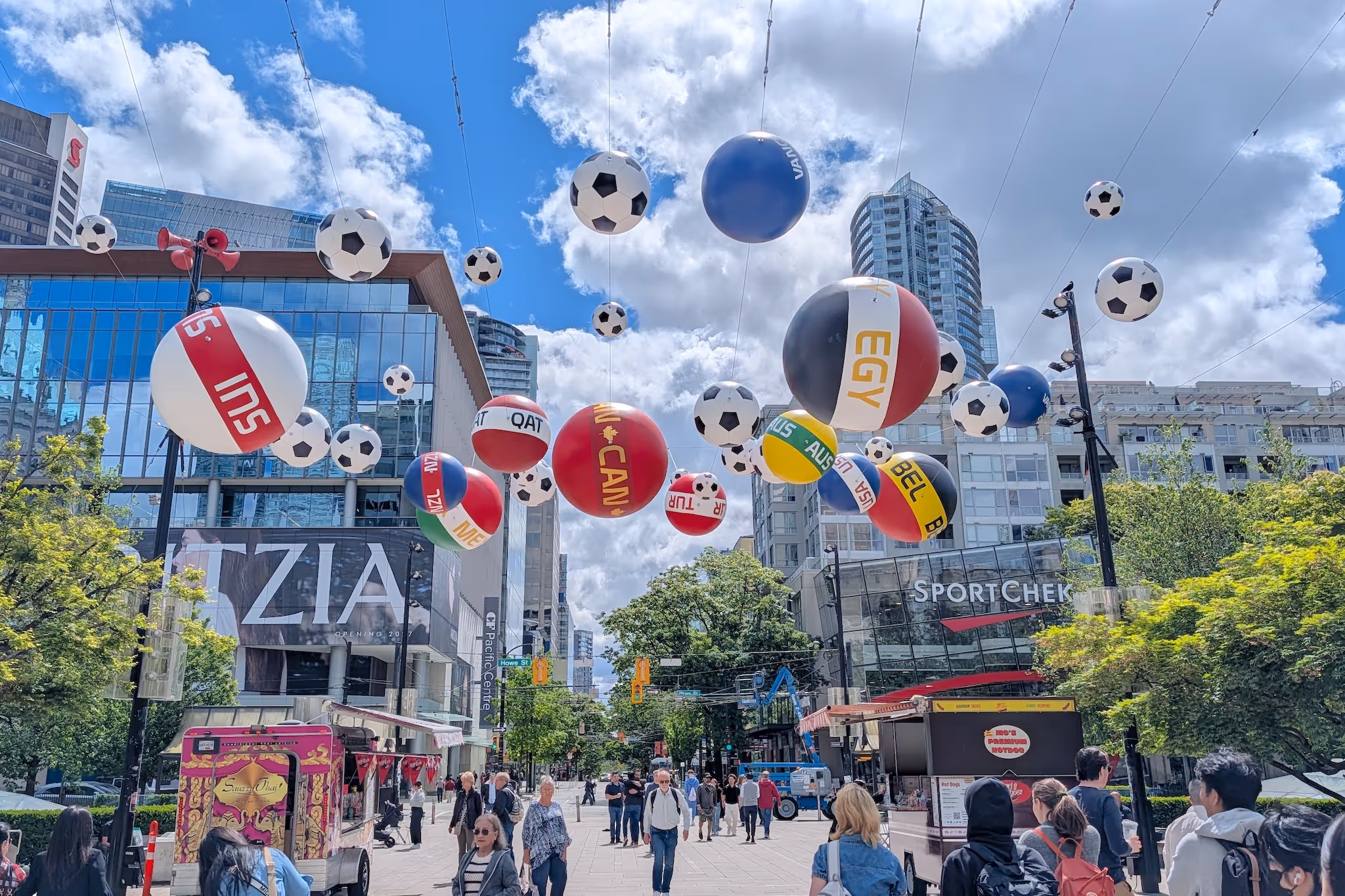 Colourful soccer ball art installation above Robson Square celebrates FIFA World Cup nations playing in Vancouver