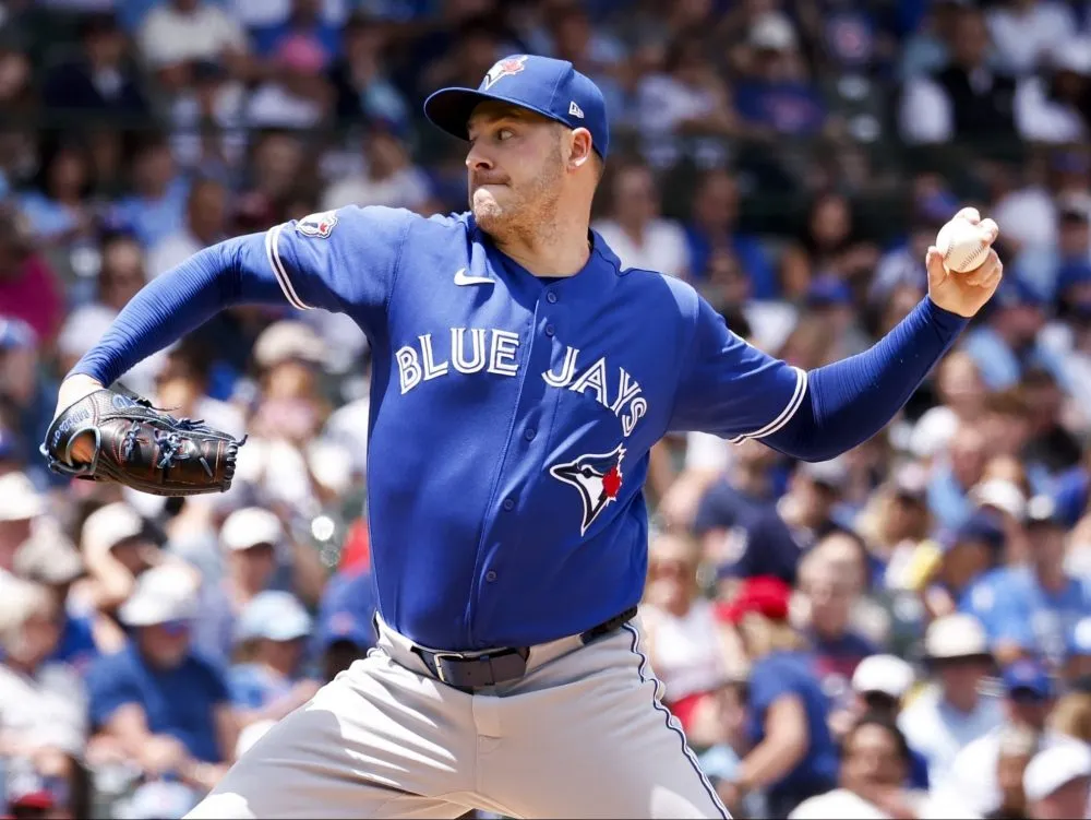 Blue Jays cap off a wild day at Wrigley Field by capping off a wild win