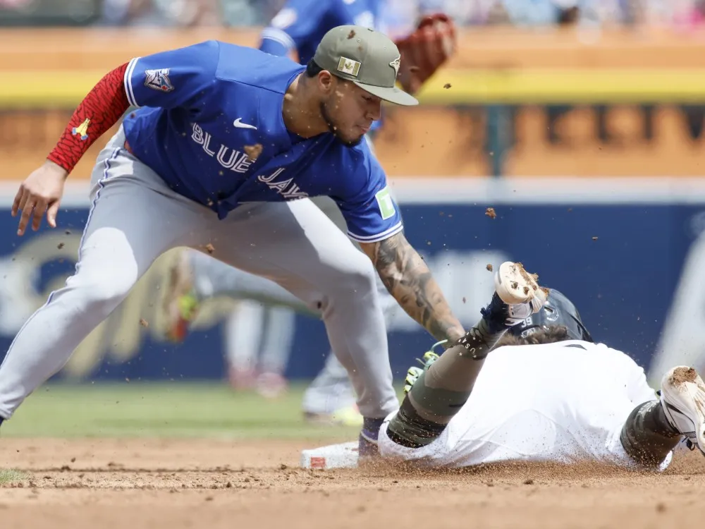 Blue Jays overcome anemic offence to prevail in extra innings against Tigers