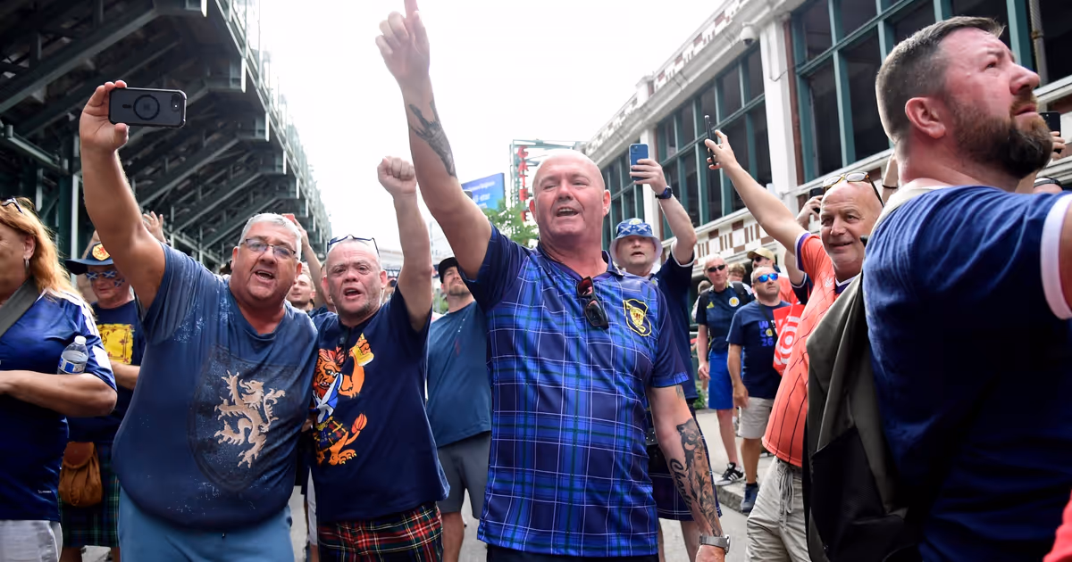 Singing Scottish soccer supporters crash Toronto Blue Jays road game