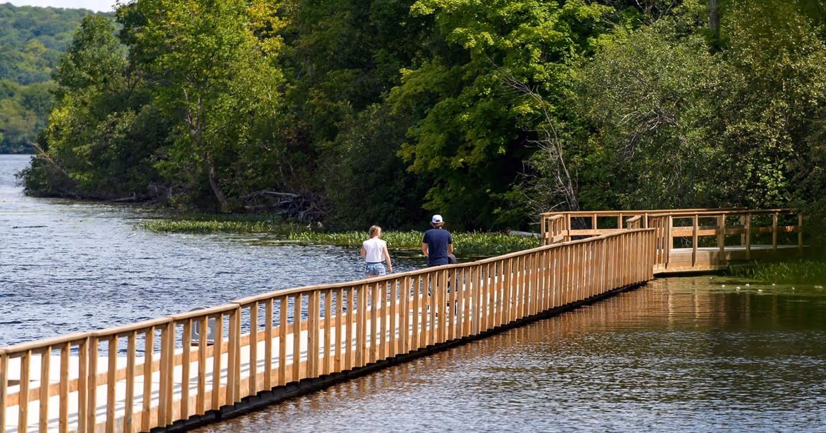You can walk on a floating boardwalk in Ontario that follows a winding river