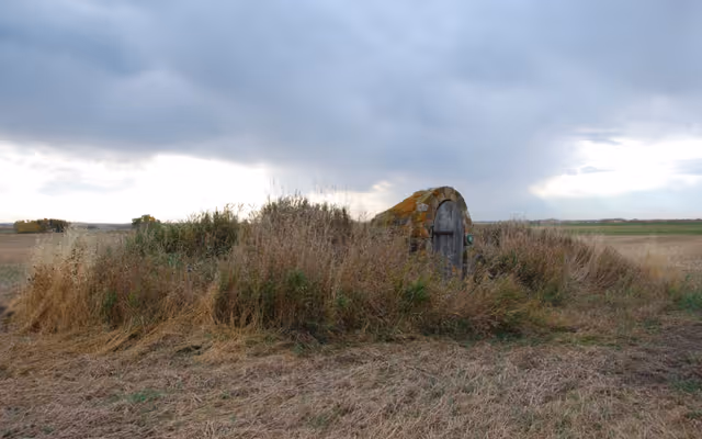 Why there's a door older than Alberta in the middle of a rural field