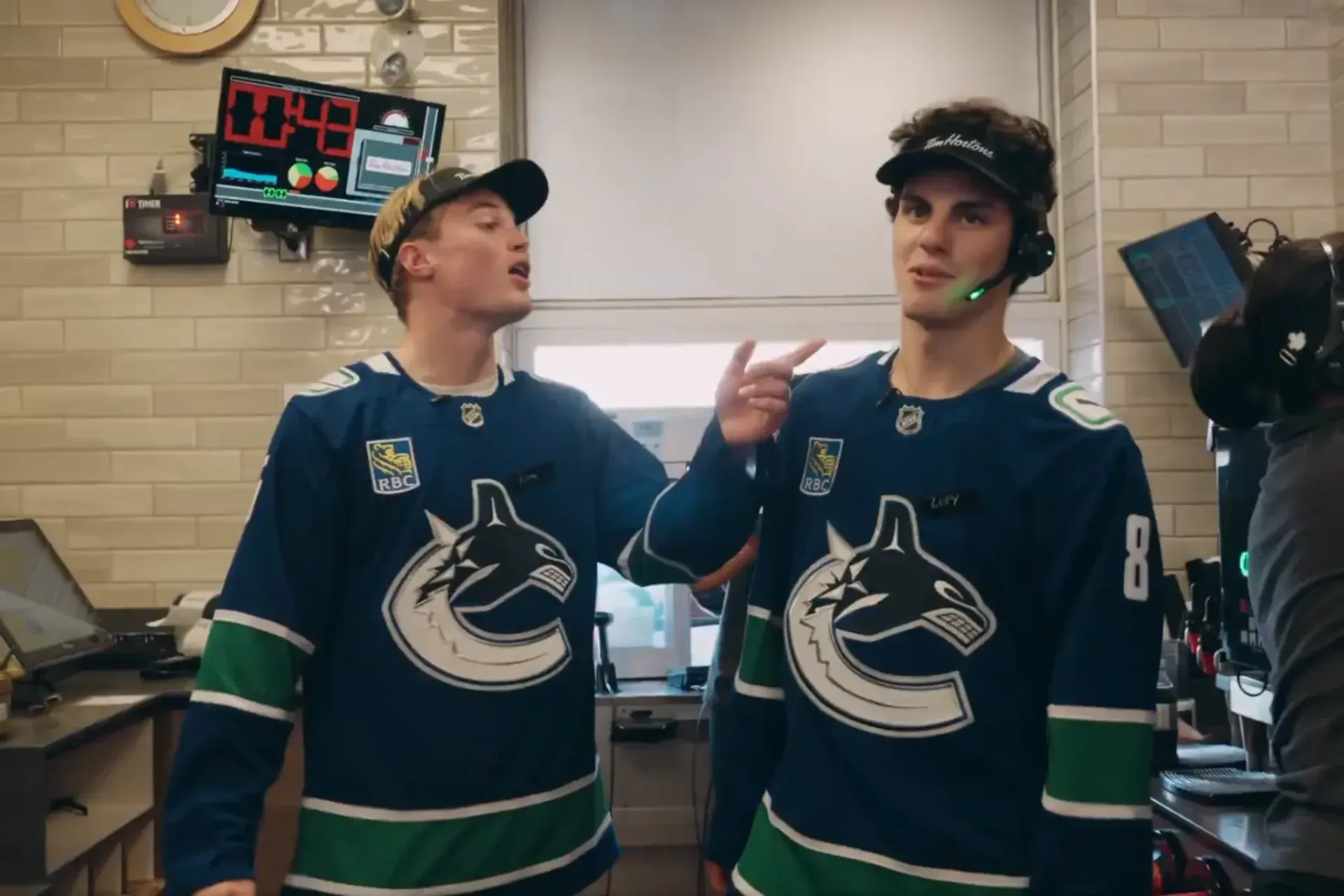 Canucks defencemen panic while working at Tim Hortons drive-thru