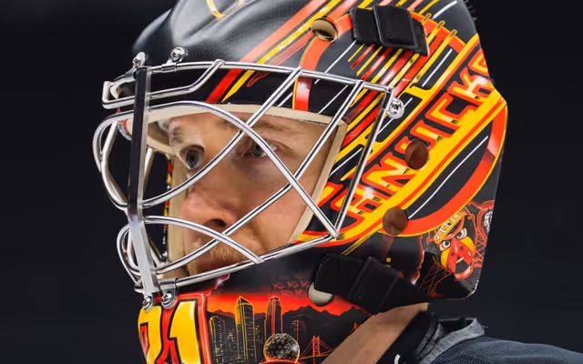New Vancouver Canucks goalie pays tribute to John Garrett