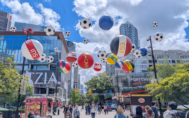 Colourful soccer ball art installation above Robson Square celebrates FIFA World Cup nations playing in Vancouver