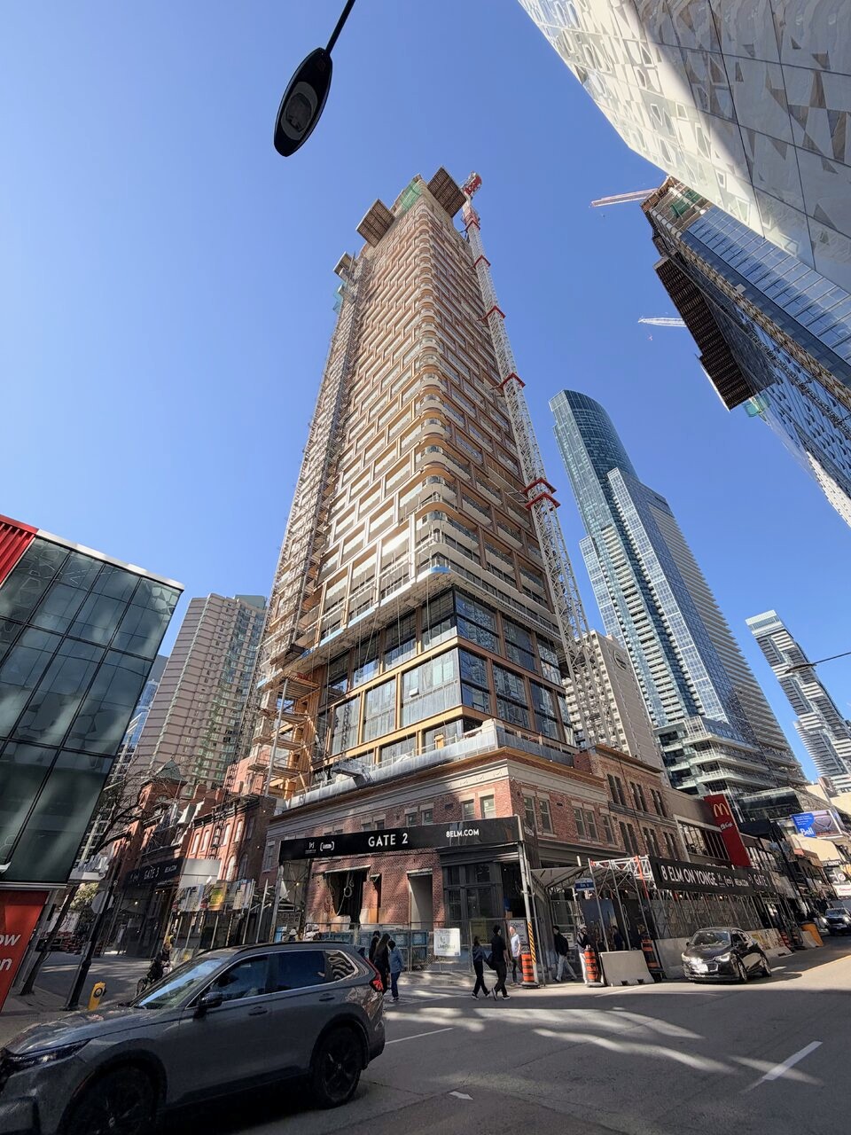 8 Elm Nears Final Floors as Bronze-Toned Cladding Climbs Higher