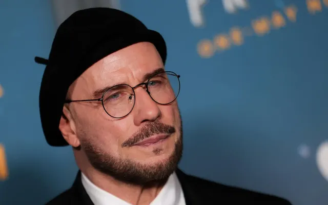 John Travolta Now Owns a Dozen Berets Because ‘Men Can Have Fun, Too. Why Not Change it Up?’