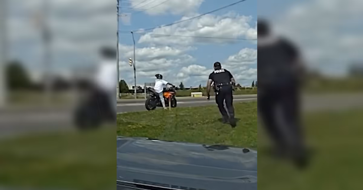 Ontario cop sneaks up and tackles suspect off motorcycle in wild arrest video