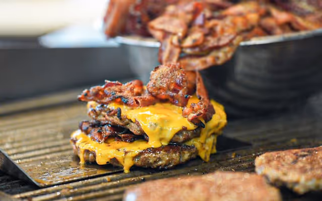 A burger shop battle has been brewing at a rural Ontario intersection for over 30 years