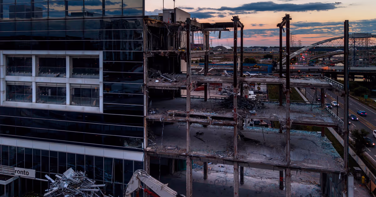 Toronto car dealership that overlooked highway for decades is being demolished