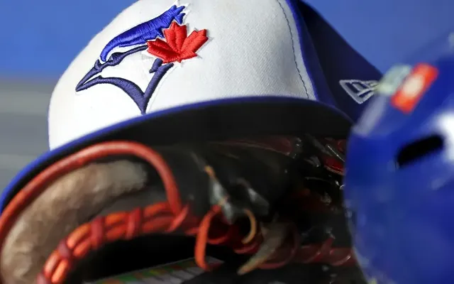 Former Toronto Blue Jays player charged in alleged scam