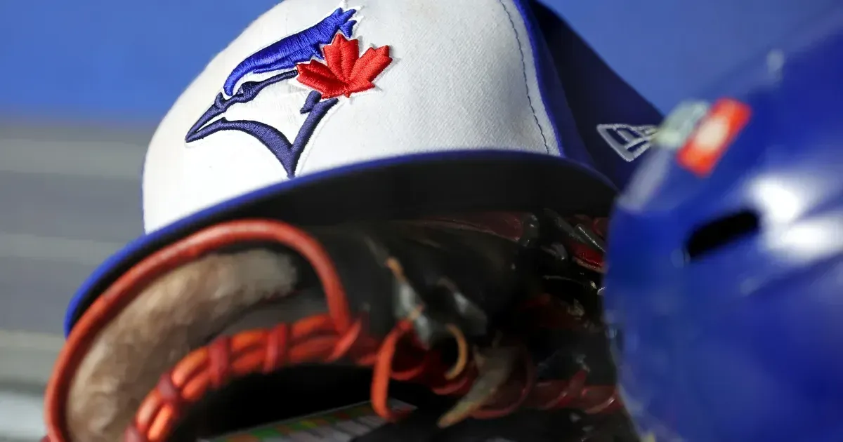 Former Toronto Blue Jays player charged in alleged scam