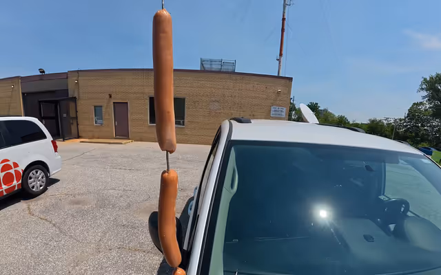 Burning question: Can this summer sizzle cook a hot dog on a vehicle antenna?